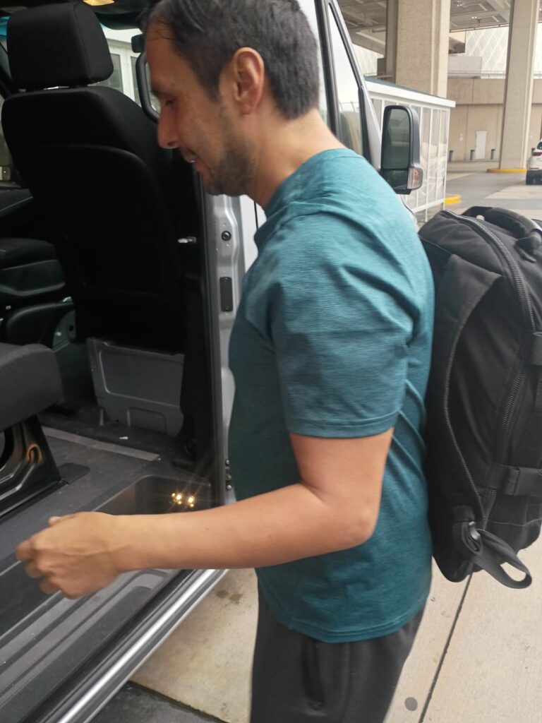 Customer Sitting In Shuttle